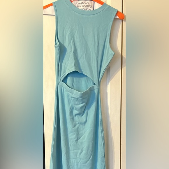 A summer light blue dress with slit on belly. - Picture 1 of 1